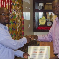 Smile Project Ghana Foundation present a plaque to Shoprite